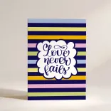 Листівка "Love never fails"